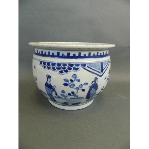 18 - A Chinese blue and white porcelain jardinière decorated with figures in a garden, 10