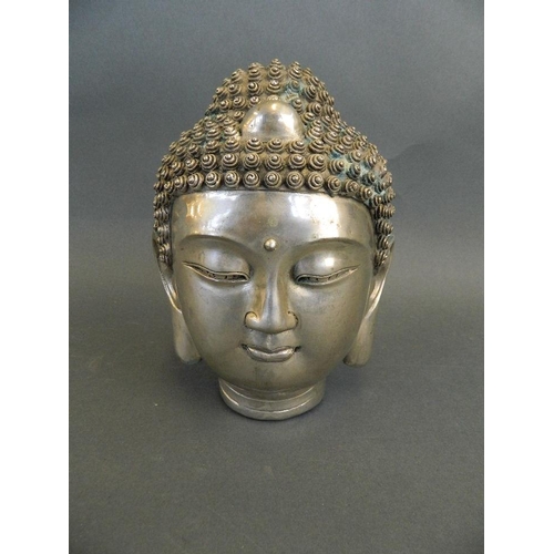 181 - A Chinese mixed metal Buddha's head, 6½