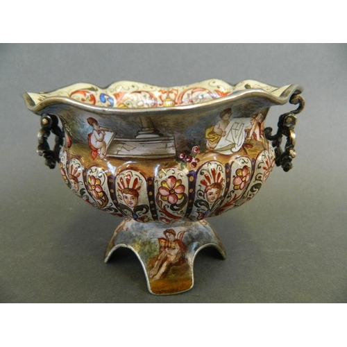 182 - A C19th Vienna enamelled miniature pedestal urn of ribbed oval design delicately painted with cherub... 