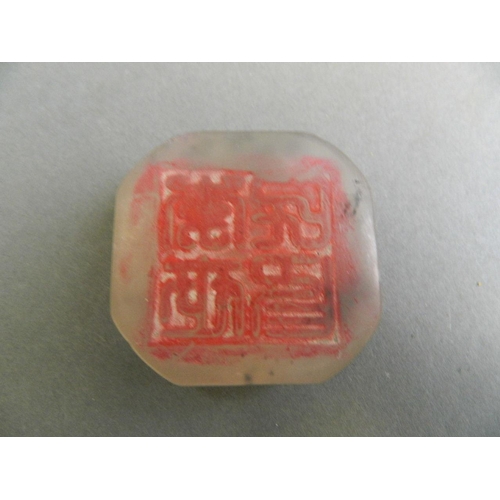 20 - A Chinese reconstituted jade seal with carved kylin knop, 2