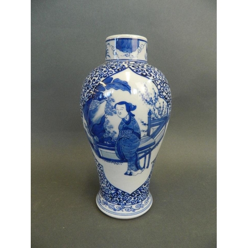 202 - A Chinese blue and white porcelain vase with decorative panels depicting women in a garden, 4 charac... 