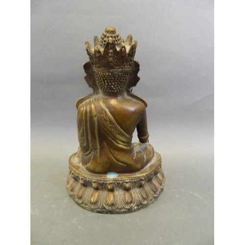 210 - A cast bronze figure of Buddha seated in meditation on a lotus throne, 8