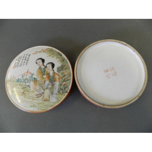 213 - A Chinese porcelain circular pot and cover, the lid decorated with figures in a garden and calligrap... 