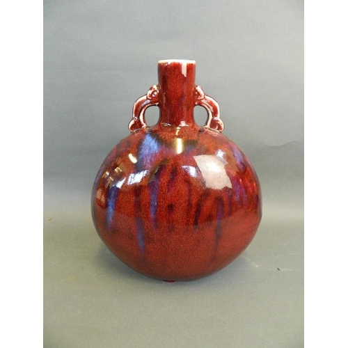 215 - A Chinese flambé glazed twin handled moonflask, 13