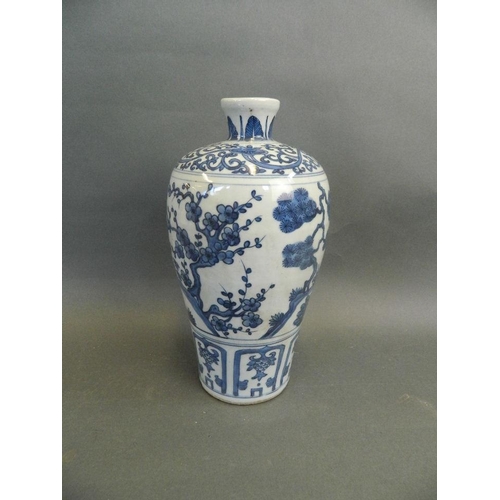 216 - A Chinese blue and white meiping vase decorated with storks and deer, 10½