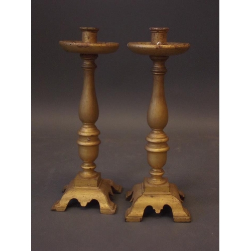 250U - A pair of C19th giltwood pricket candlesticks, 15