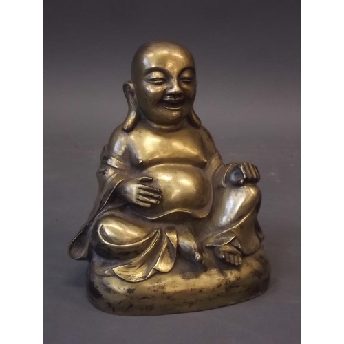 250X - An Oriental brass figure of Buddha, 8½