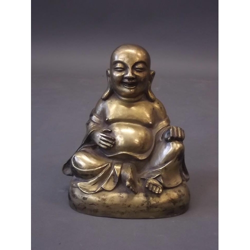 250X - An Oriental brass figure of Buddha, 8½