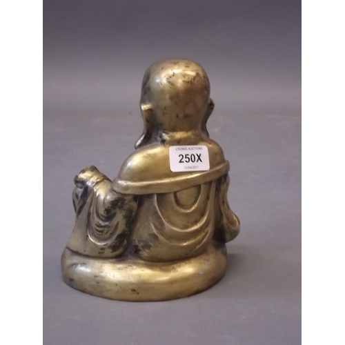 250X - An Oriental brass figure of Buddha, 8½