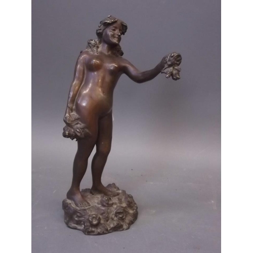 250Y - A bronze figure of a nude offering a posy of roses, 15