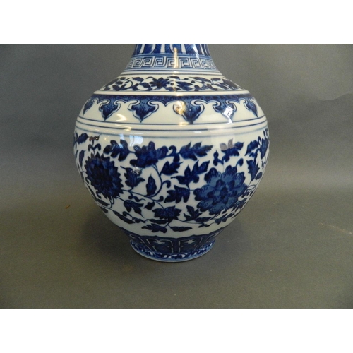 33 - A large Chinese blue and white vase with scrolling lotus flower decoration, seal mark to base, 15