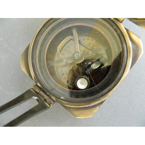 37 - A brass cased sighting compass, the lid marked 'Kelvin & Hughes, London', 3