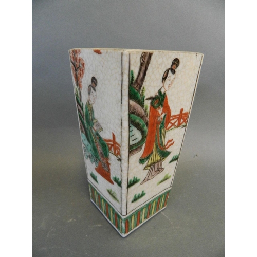 478 - A Chinese porcelain square section vase decorated in bright enamels with figures in a garden, 6 char... 