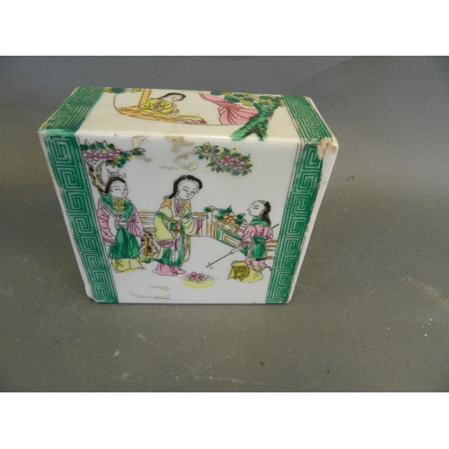 481 - A Chinese rectangular porcelain flower brick with painted enamel decoration of figures in a garden, ... 