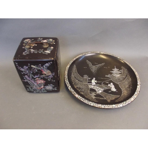 483 - A Chinese black lacquer box with inlaid decoration of birds amongst blossom in coloured shells, the ... 