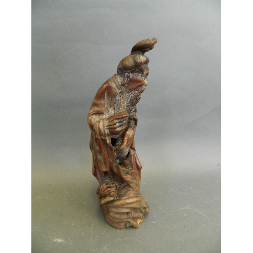 50C - A Chinese carved bamboo figure of a bearded sage, 10