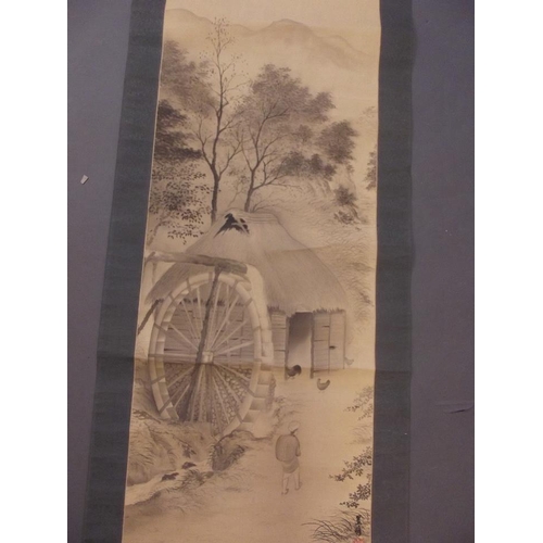 50D - A Chinese watercolour scroll depicting a traveller next to a watermill, on a bone roller with a fitt... 