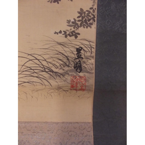 50D - A Chinese watercolour scroll depicting a traveller next to a watermill, on a bone roller with a fitt... 