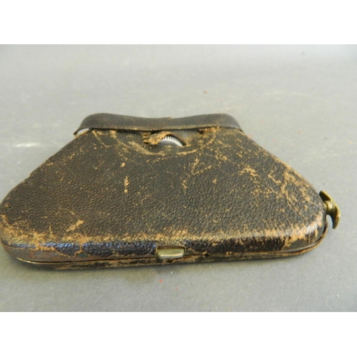 50H - A pair of patent action leather cased folding opera glasses by 'La Mignonne, France', 4½