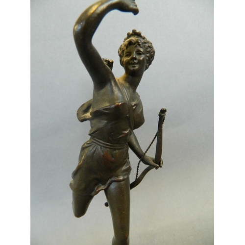 50K - A bronze figure of Diana the Huntress, on a turned marble socle, 8