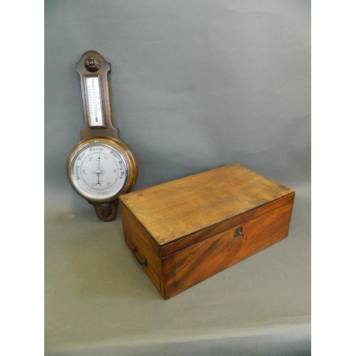 50W - A mahogany writing slope with fitted interior, together with an oak banjo barometer, 16