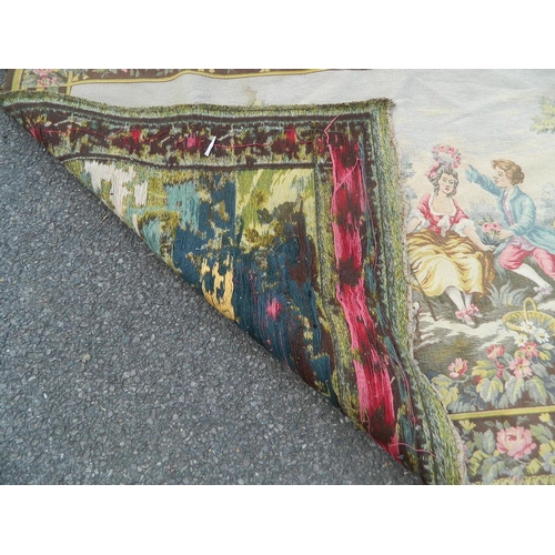 50Z - A Belgian tapestry wall hanging decorated with figures in a floral garden, after Angelika Kaufmann, ... 