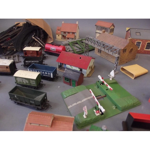 57 - A quantity of Hornby track, rolling stock, one engine, buildings etc