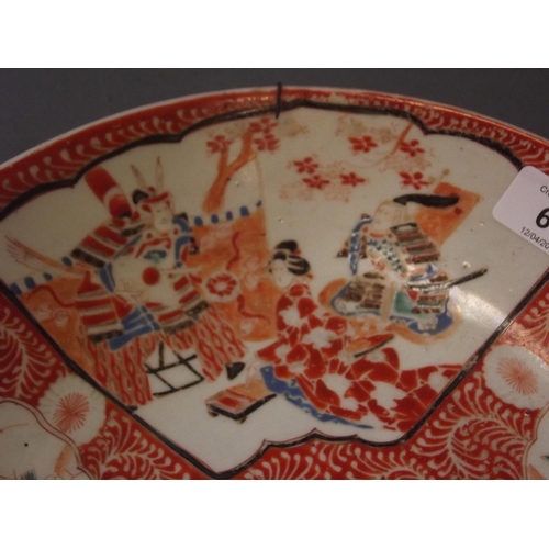 61 - A Japanese Meiji period dish with bright red enamel decoration and paintings of samurai, 6 character... 