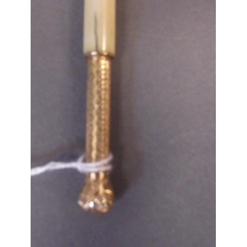 66 - A late C19th/early C20th gilt and ivory propelling pencil with engine turned body, patent 'March 21,... 