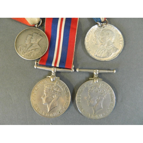 72 - Two WWII service medals, together with coronation medals commemorating George & Queen Mary, and Geor... 