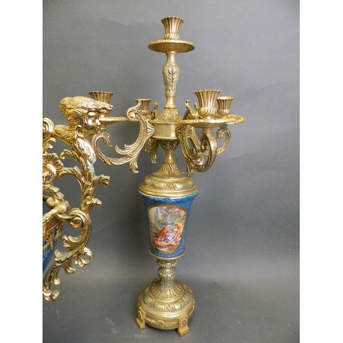 87 - A Sevres style garniture with ormolu mounts consisting of an urn and four branch candlesticks with c... 