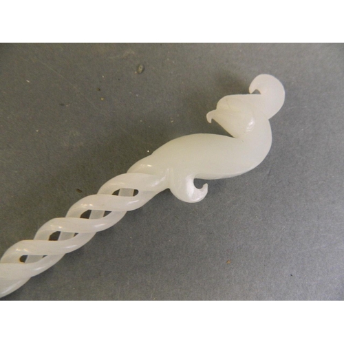 88 - A Chinese white jade hairpin with carved phoenix to handle and pierced spiral stem, 10