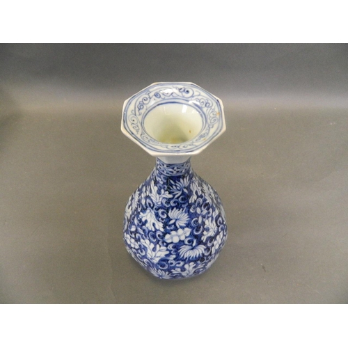 13 - A Chinese blue and white porcelain vase with floral decoration, 10½