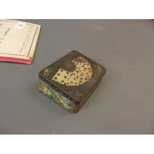 35 - A hand painted tin box, a mahogany box containing dominoes and cigarette cards, an Art Deco chrome p... 