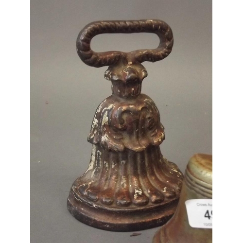 49 - A Victorian cast iron doorstop marked 'A.K. & Sons', and another, together with a painted stop in th... 