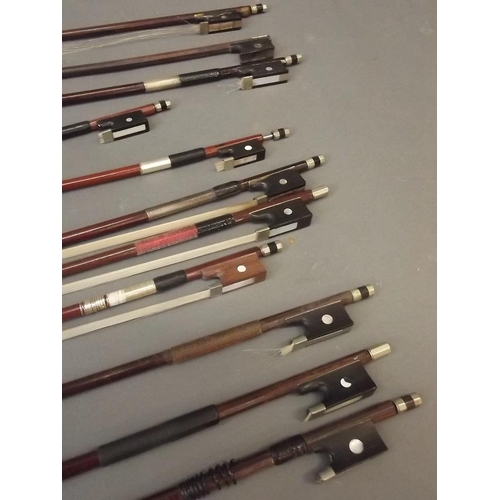 50A - A collection of violin bows, one stamped 'Tourte', another 'L. Bausch', 'Suzuki' etc (11)