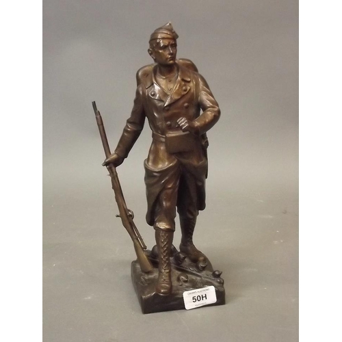 50H - E. Carlier, bronze figure of a French soldier of the Great War with gilt brown patination, signed, 1... 