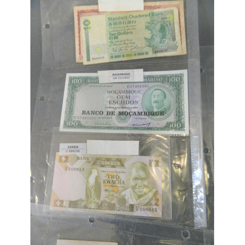 6 - A collection of World bank notes including early Chinese 1 yen, Hong Kong 10 dollar, Turkey, Mozambi... 