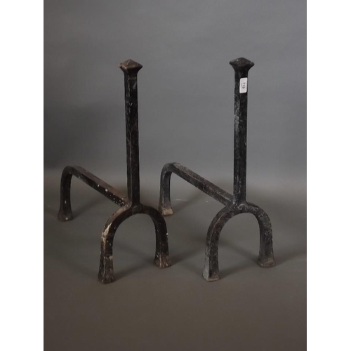 818 - A pair of wrought iron fire dogs, 24