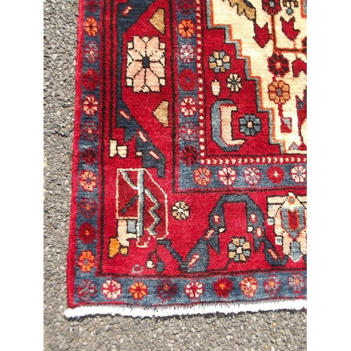 819 - A full pile Persian Hamadan, Luri, Village carpet, 55