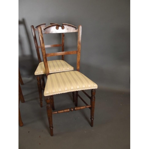 785 - A pair of Edwardian inlaid side chairs, and another pair