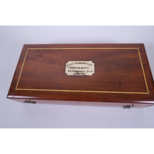 22 - A mahogany cased 'Sikes' hydrometer, retailed by Hughes & Sons of London, case 9½