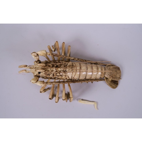 50 - A Chinese sectional bone articulated figure of a crayfish, signed to base, 9½ long (AF losses)