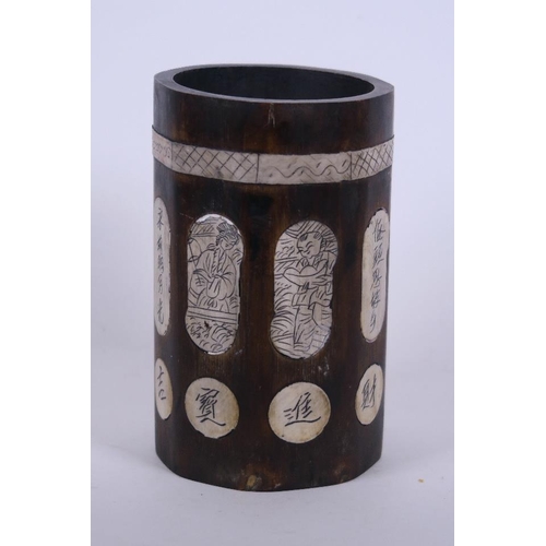 50C - A Chinese octagonal bamboo brush pot with inset composition panels engraved with calligraphy and fig... 