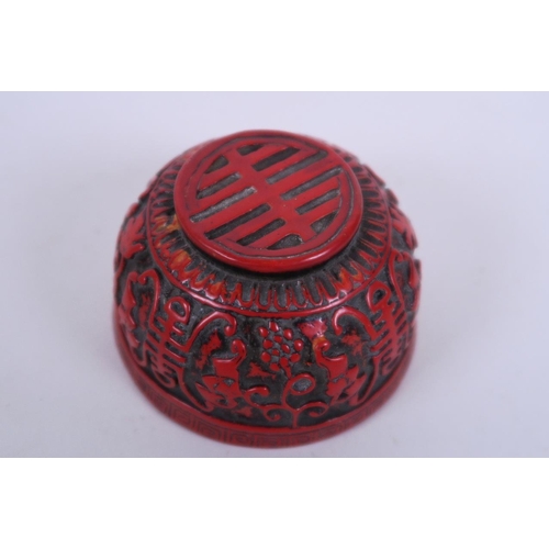 50J - A Chinese cinnabar lacquer style cup decorated with symbols and bats, 3