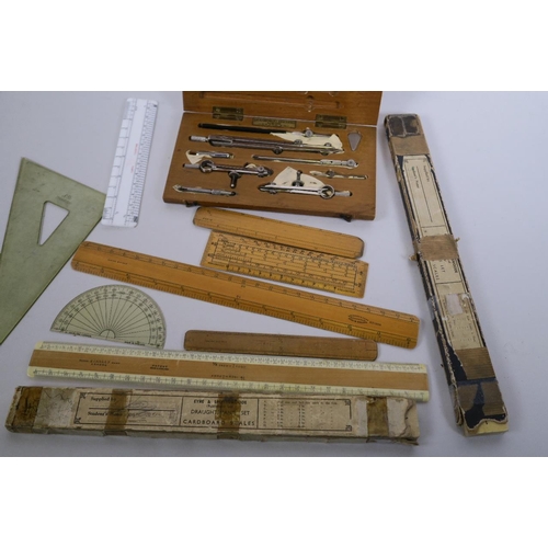 50L - A cased drawing set by 'Draughtsmans Requisites Ltd, London', two sets of cardboard scales, and vari... 