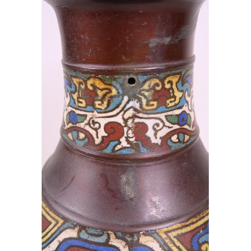 6 - A Chinese bronze vase with archaic style cloisonné banded decoration, 9½