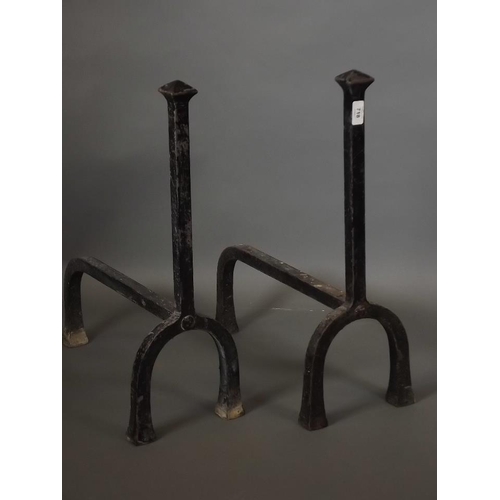 818 - A pair of wrought iron fire dogs, 24