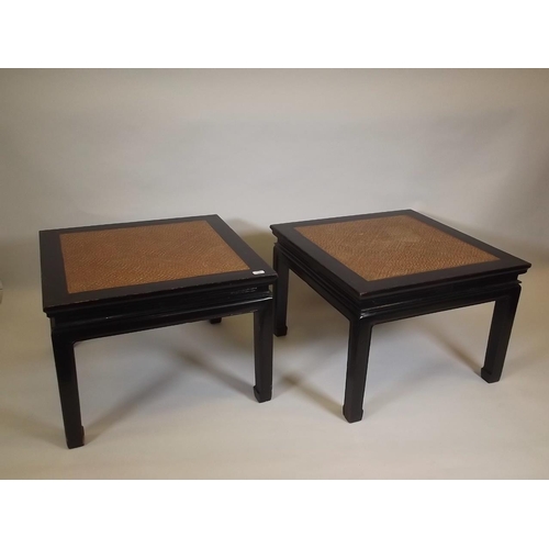 897 - A pair of Oriental lacquered occasional tables with inset cane tops, mid C20th