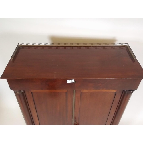 872 - A C19th mahogany side cabinet, with frieze drawer and two cupboards, the top with pierced brass gall... 